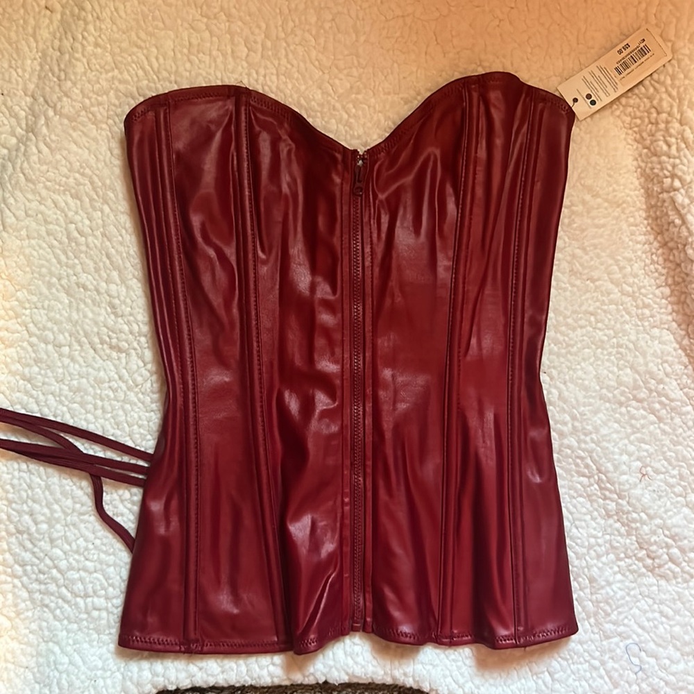Brand new with tags maroon colored corset size medium, lace up back